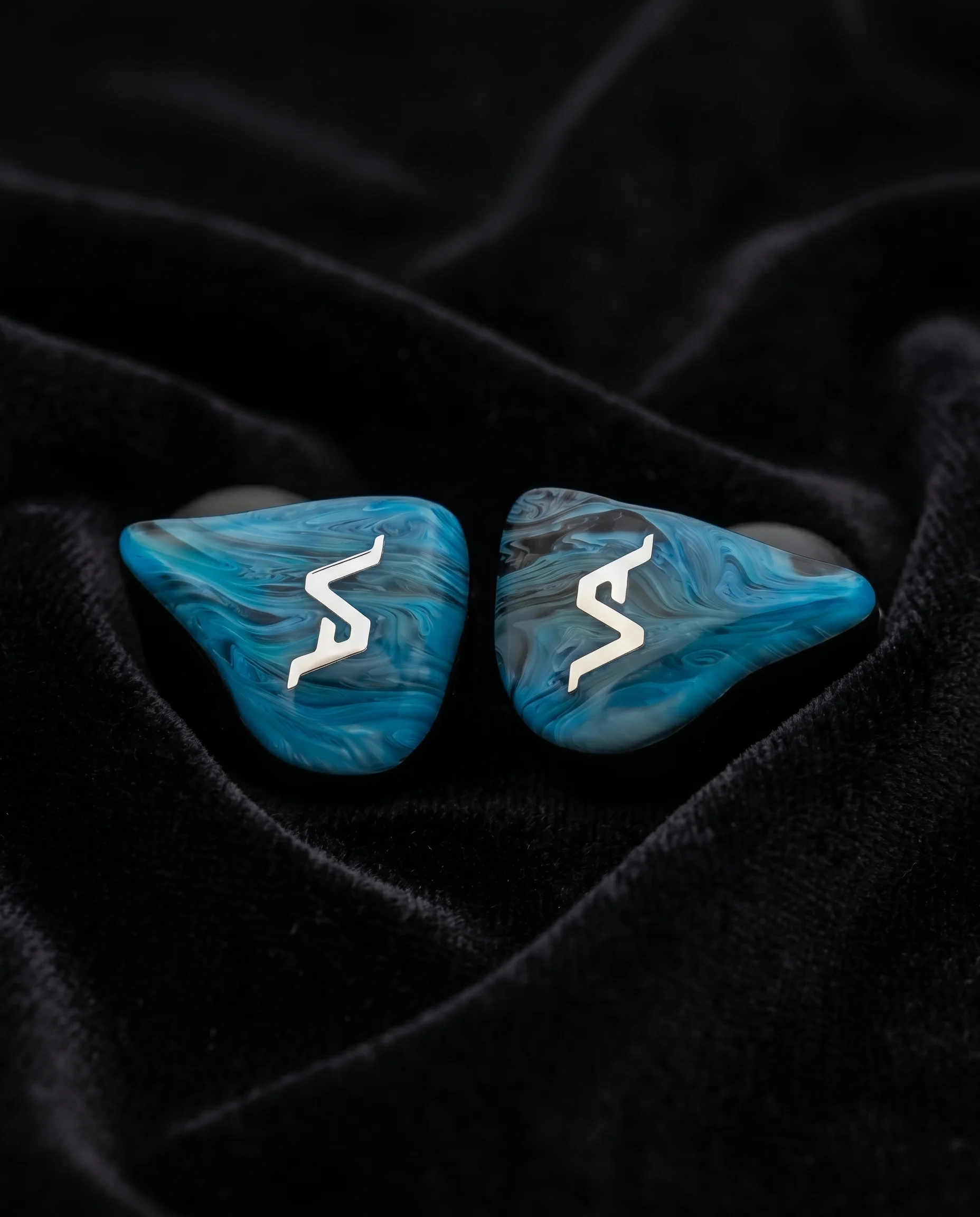 Blue marble faceplate with polished chrome mark