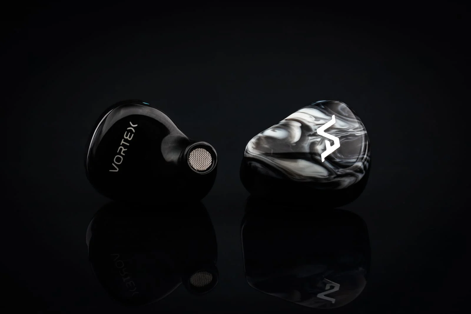Virtus Audio Vortex — pair showing the monochrome swirl faceplate
